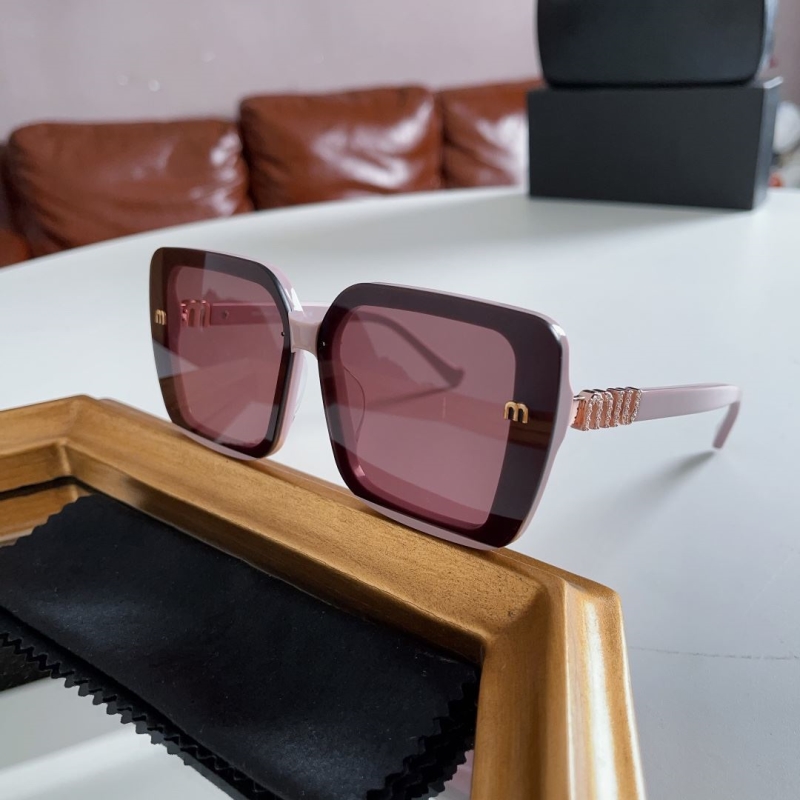 Miu miu Sunglasses